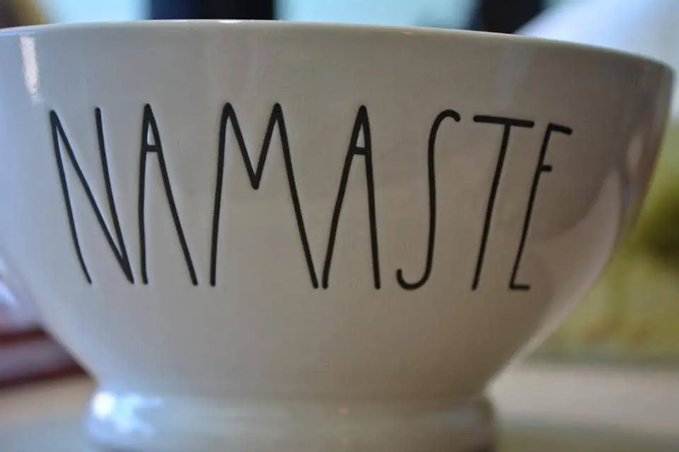 A Coffee Mug with the Word Namaste on the Side