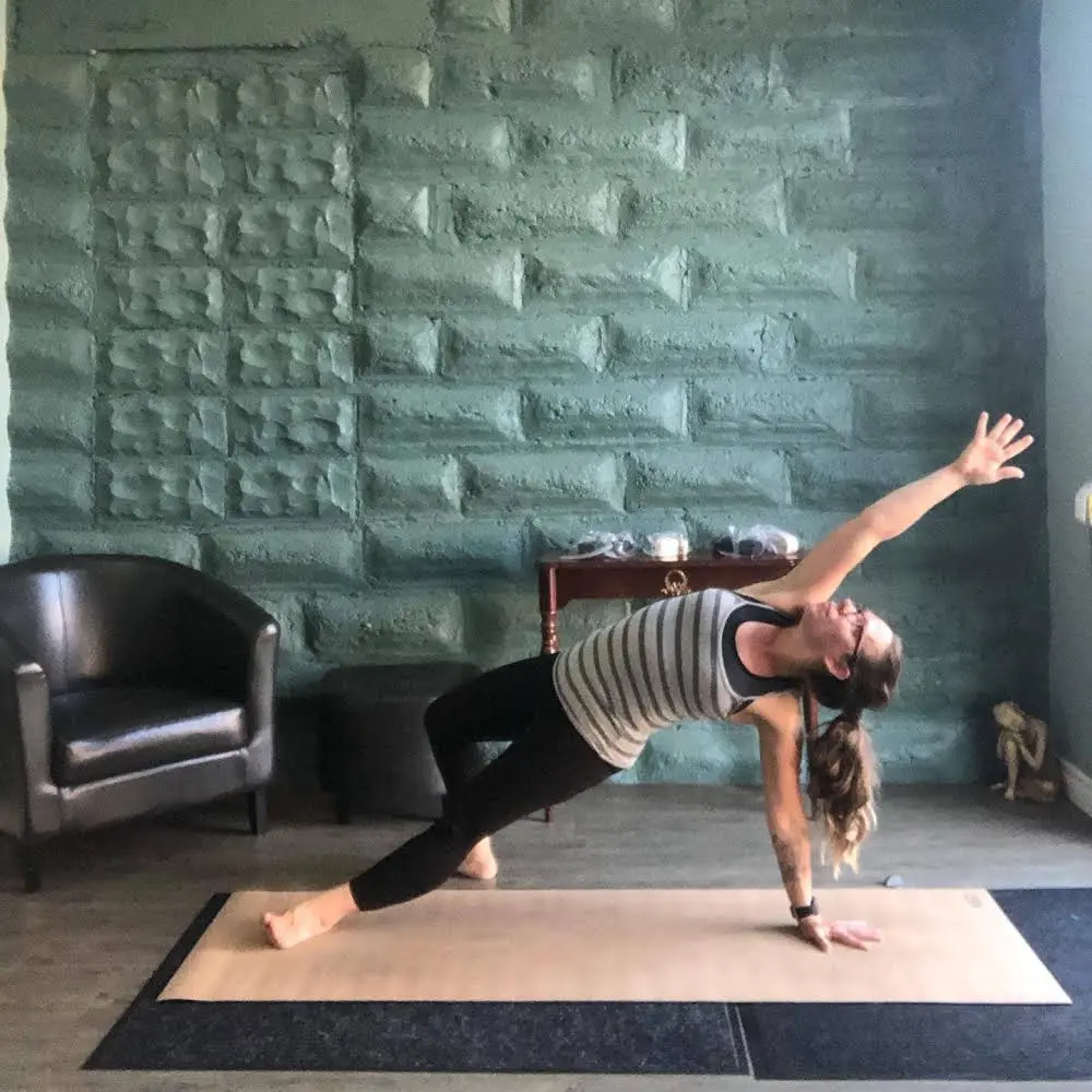 A Yoga Teacher in Side Plank Pose